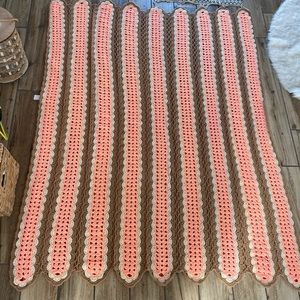 Tan coral and ivory knit blanket